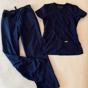 Grey’s Anatomy navy scrub top and bottom.